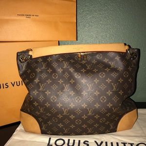 100% authentic Louis Vuitton purse.